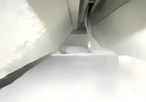 Atomized targeted adhesive spraying